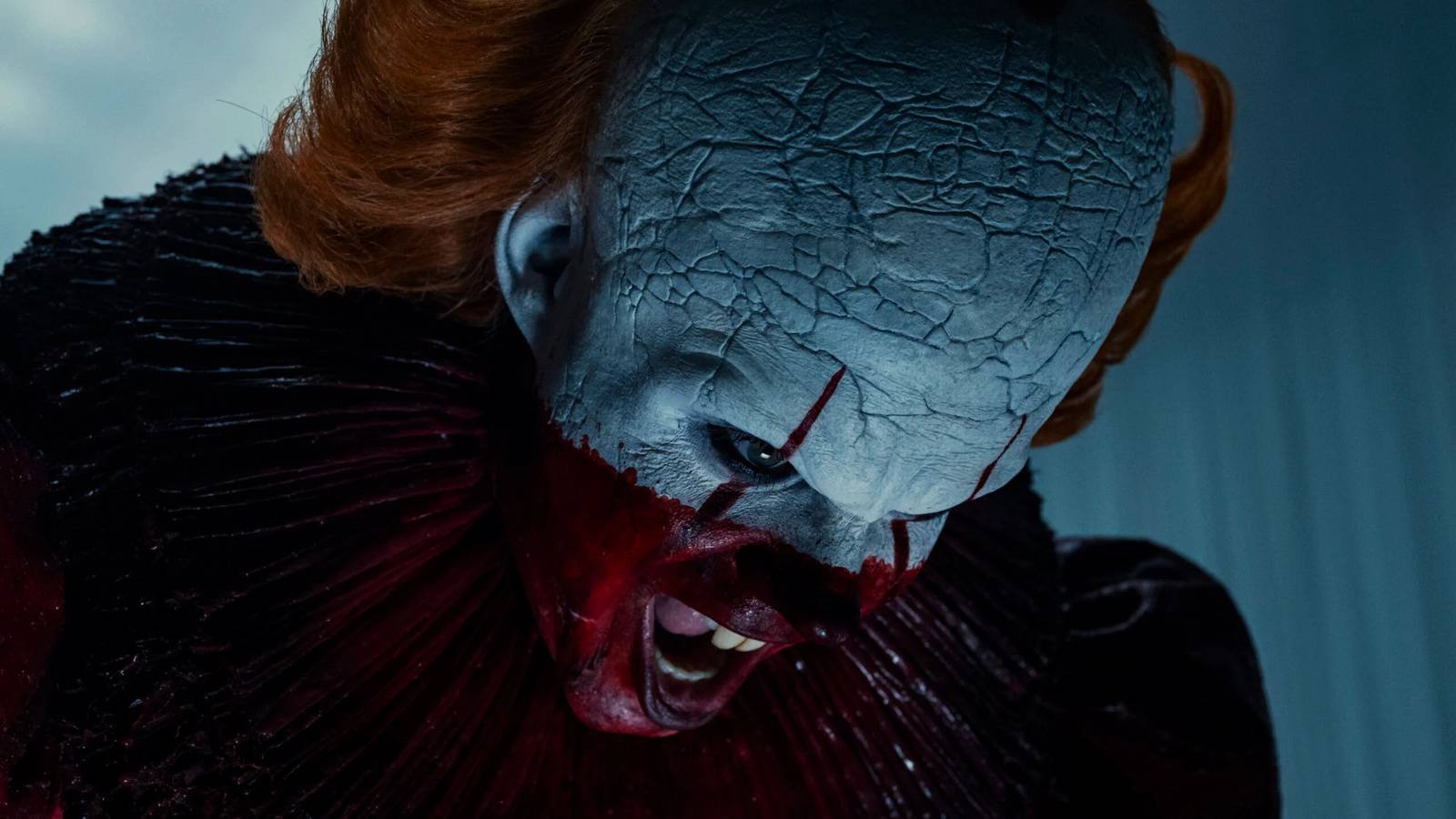 Pennywise with blood on his face in It Welcome to Derry