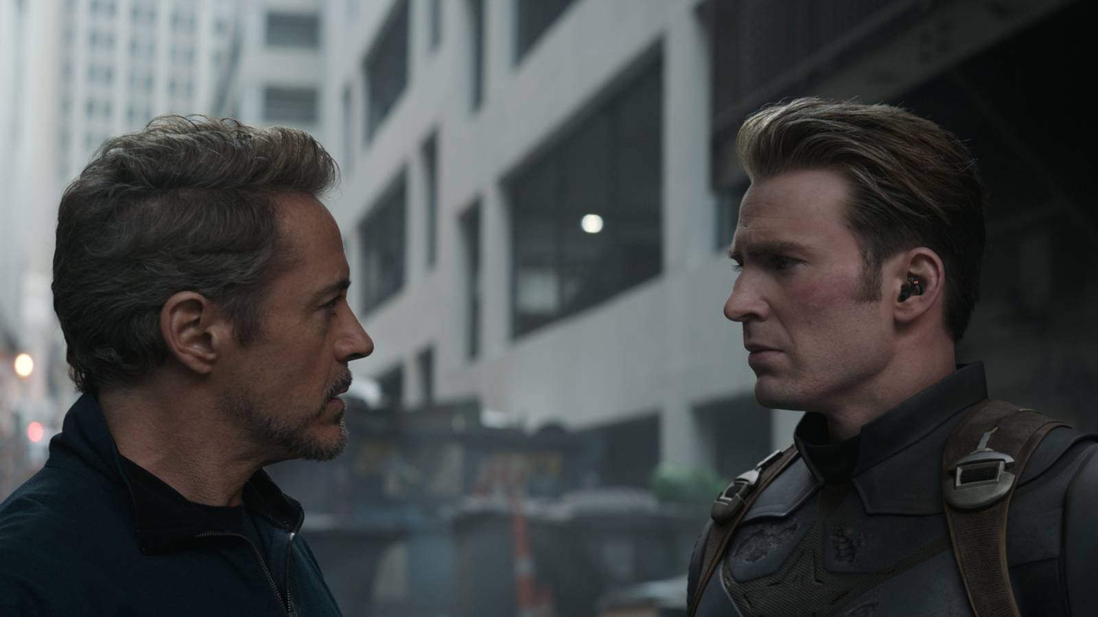 Robert Downey Jr. as Tony Stark looking at Chris Evans as Steve Rogers in Avengers: Endgame