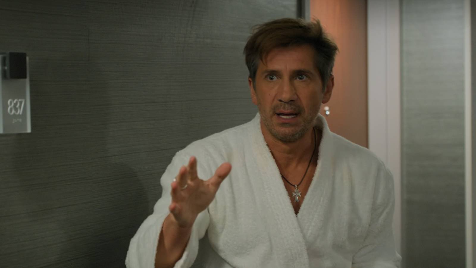 Alex Gazarian is wearing a robe in The Lincoln Lawyer season 4