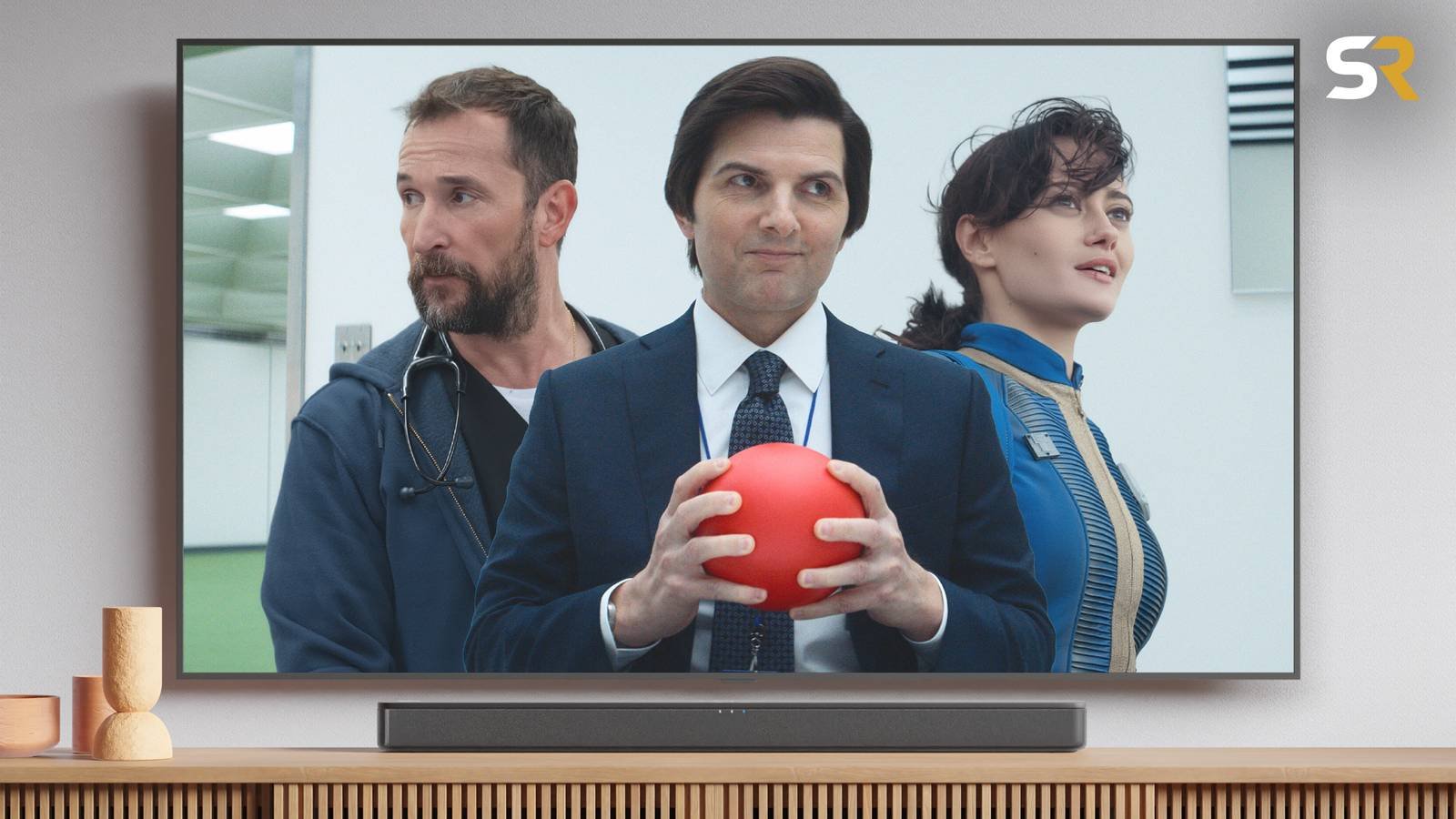 TV screen featuring Severance's Mark, The Pitt's Dr. Robby, and Fallout's Lucy.