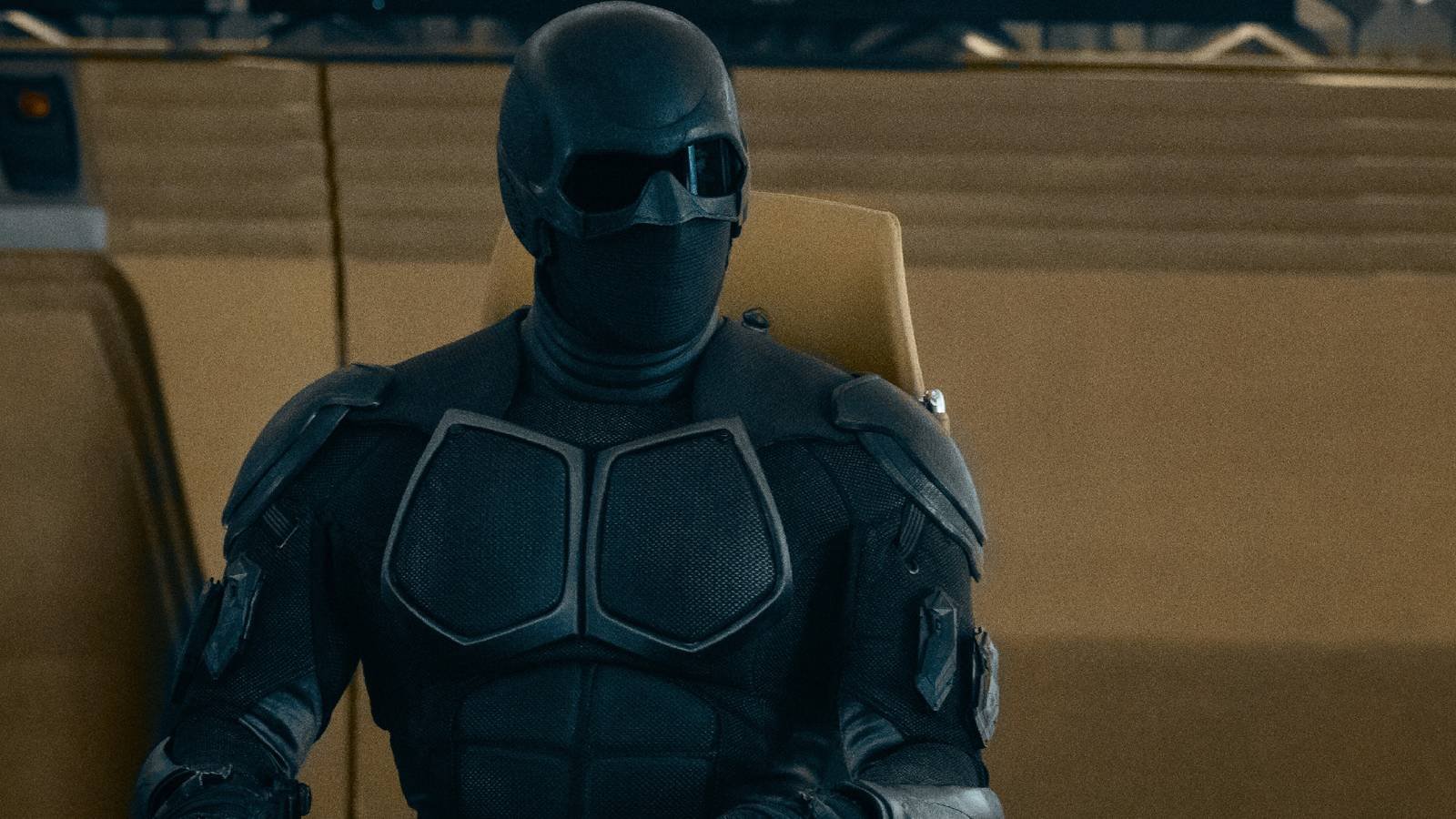 Black Noir sitting as the Seven desk in The Boys