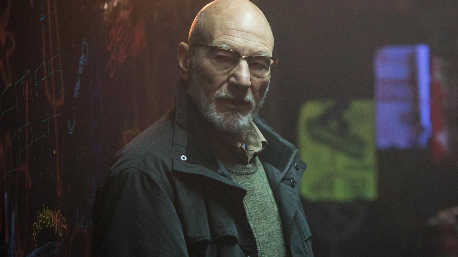 Patrick Stewart looking off-screen in Green Room