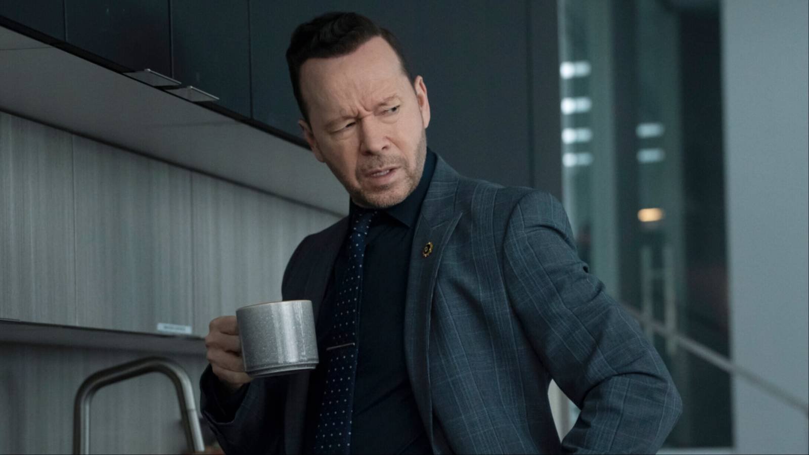 Danny Reagan drinking coffee in Boston Blue Season 1