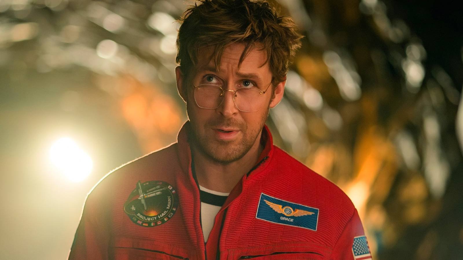 Ryan Gosling as Ryland Grace looking at Rocky in Project Hail Mary