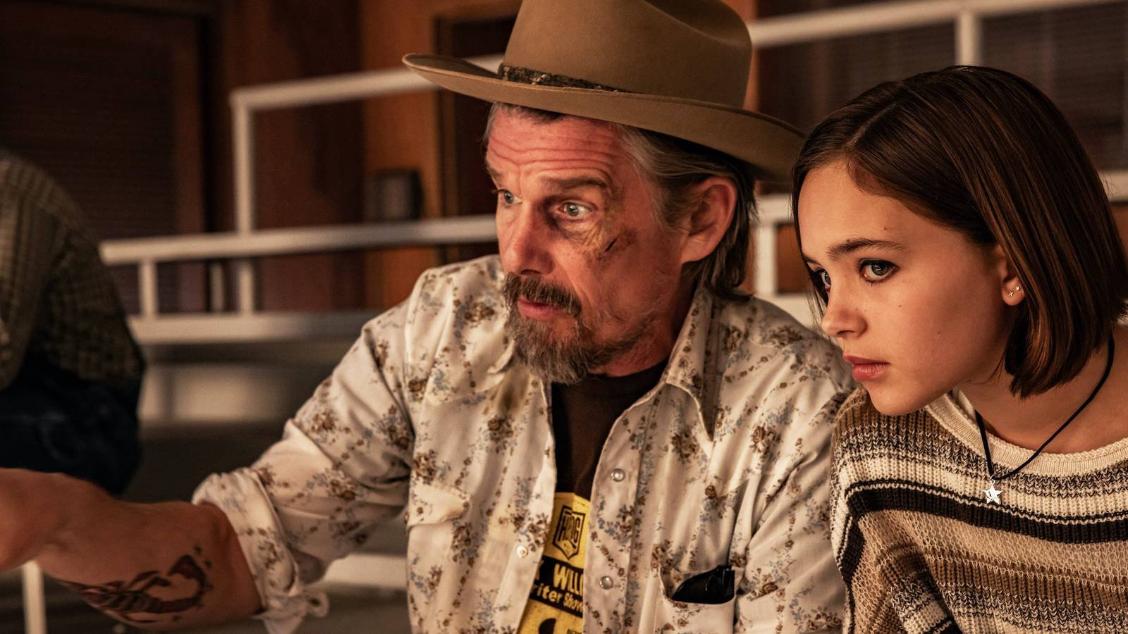 Lee Raybon and his teenage daughter Francis looking at something