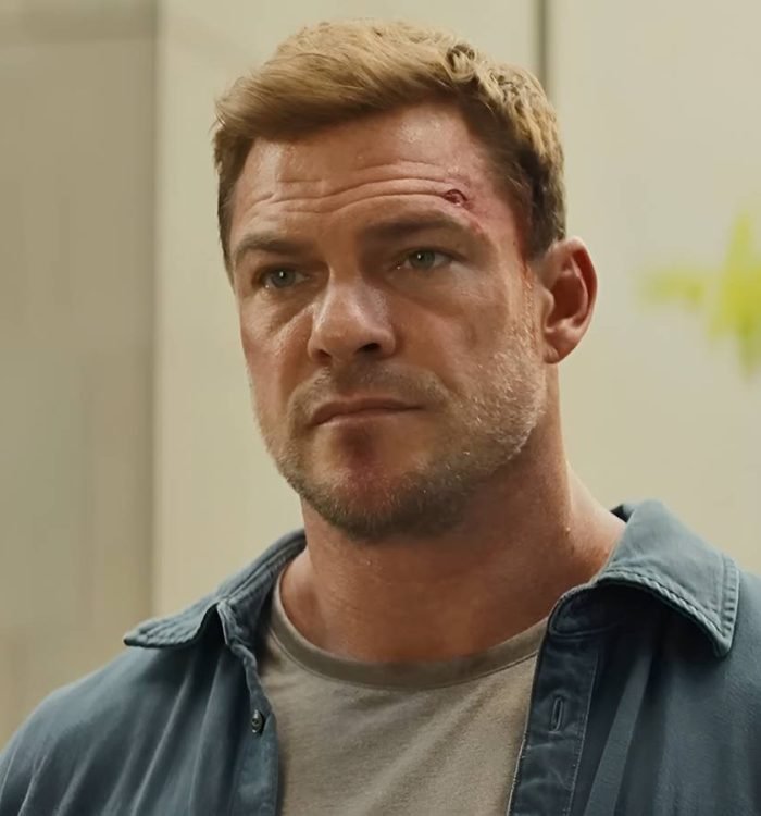 Alan Ritchson’s Jack Reacher listening carefully in Reacher season 4